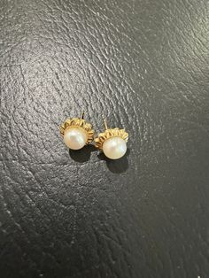 Vintage 14k Solid Gold and Genuine Pearl Flower Post Earrings Description: These Vintage 14k Solid Gold and Genuine Pearl Flower Post Earrings feature a classic design with natural white pearls set in elegant 14k solid gold. The earrings weigh 1.23g, with each earring measuring 9.8mm in diameter and a pearl diameter of 6.4mm. The floral design adds a timeless charm, perfect for any occasion. Personalize it! Wear it alone for a bold, classic, minimalistic vibe or layer and stack with dainty to st Elegant White Gold Earrings Stamped 14k, Elegant White Gold 14k Stamped Earrings, Classic White 14k Gold Earrings, Classic 14k Gold Pearl Earrings For Pierced Ears, Classic Yellow Gold Earrings With Pearl Charm, 14k Gold White Pearl Pierced Earrings, Classic 14k Gold Matching Pearl Earrings, Dainty White Gold Pearl Earrings For Formal Events, Dainty White Gold Pearl Earrings For Formal Occasions