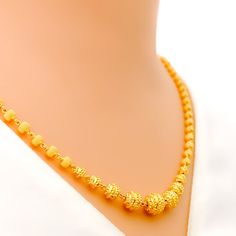 This exquisite 22k gold Lara necklace set, weighing 28.4 grams, features a radiant yellow gold finish and a striking striped design. The necklace measures 20 inches in length, with adjustable 0.6-inch links for a perfect fit. The set includes matching earrings, each 1.5 inches long with screw back posts and detachable hanging elements. Secured with a hook lock, this set is ideal for those who appreciate elegant and sophisticated jewelry, combining timeless beauty with a bold striped motif, makin 22k Gold Temple Jewelry In Yellow, Traditional Yellow Gold-plated Necklace, 22k Gold Yellow Temple Jewelry, Yellow 22k Gold Temple Jewelry, Elegant Gold Plated Yellow Bridal Necklace, Elegant Yellow Gold Plated Bridal Necklace, Elegant 22k Gold Temple Necklace In Yellow, Elegant 22k Gold Jewelry In Yellow, Elegant 22k Gold Yellow Temple Necklace