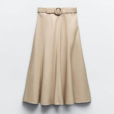 *New With Tags!* High Waist Midi Skirt With Belt Loops. Belt With Braided Self-Lined Buckle. Side Hidden In-Seam Zip Closure. Color: Sand Outer Shell Base Fabric 100% Polyester Coating 100% Polyurethane Pat Dry. Elegant Beige Belted Skirt, Spring Leather Midi-length Skirt, Spring Leather Midi Skirt, Elegant Zara Midi Skirt, Spring Knee-length Leather Skirt, Leather Flared Skirt For Spring, Spring Leather Flared Skirt, Elegant Zara Skirt For Fall, Zara Midi Skirt For Work