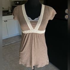 Rare Y2k Abercrombie Light Brown Babydoll Short Sleeve Top. Ivory Embroidered Neckline And Waist. Size Xs. Could Fit Xxs As Well. Pit To Pit: 13 1/2 Under-Bust: Flat Across 12 1/2 Length: 25 No Flaws. Lace Tank Not Included. Brown Clothes, Y2k Abercrombie, Sleeveless Tops Summer, Floral Peplum, Embroidered Neckline, Lace Babydoll, Lace Hem, Babydoll Top, Lace Tank Top