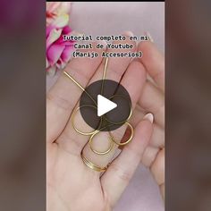 a hand holding a wire with an object in it's center and the words, how to make your own video