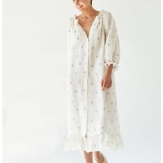 Sleeper Floral Loungewear Dress Women's Size L/Xl Midi Length Color: White With Floral Ditsy Flowers Pleated & Ruffle Accents Three-Quarter Sleeve With Scoop Neck 100% Linen Full Button Down Made In Ukraine. Measurements Laid Flat: Pit To Pit: 21" Length: 42” One Size 1-Comfortably Fits Those Who Are Between A Size Xs-Xl (2-12) And All Body Shapes. Pre-Owned. Excellent Condition. Tags: Granny, Cottage Core, Ditsy, Floral, Prairie, Lounge, Comfy Poofy Dresses, Poofy Dress, Loungewear Dress, Loungewear Luxury, Lounge Dress, Prairie Dress, Matches Fashion, Trending Dresses, Favorite Dress