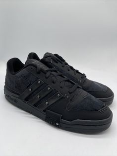 Introducing the adidas Originals Forum Exhibit Low in Black, available in Men's sizes 5.5-10. This sneaker showcases adidas' iconic style and quality with its low top shoe shaft, athletic type, and GW8726 style code. The Forum Exhibit Low is perfect for men who want to stay stylish and comfortable in their daily routine or during light physical activities. This adidas Originals sneaker is a great addition to any shoe collection and is perfect for those who want to express their fashion sense. The Forum Exhibit Low comes in black and features the adidas Originals product line, making it a great choice for those who want to stay trendy. Get your pair today and experience the comfort and style that only adidas can offer. Adidas Skate Shoes With Boost Midsole For Streetwear, Adidas Low-top Custom Sneakers For Sports, Three Stripes Skate Shoes For Streetwear, Adidas Logo Low-top Custom Sneakers For Sports, Urban Adidas Low-top Custom Sneakers, Adidas Logo Custom Low-top Sneakers For Streetwear, Urban Low-top Custom Adidas Sneakers, Synthetic Skate Shoes For Streetwear, Low-top Basketball Shoes With Studded Rubber Outsoles