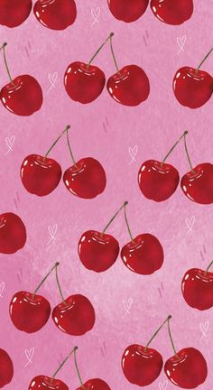 a pink background with cherries and hearts