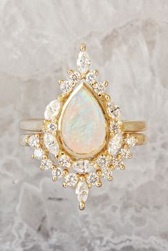 Opal Engagement Ring Set - pear shape Audtralian fire Opal & diamonds vintage inspired bridal ring set, available in 14K or 18K gold . Handmade & designed by Silly Shiny Diamonds Heirloom Yellow Gold Stackable Rings For Wedding, Teardrop Prong Setting Wedding Ring, Heirloom Yellow Gold Diamond Wedding Ring, Wedding Opal Ring With Brilliant Cut Diamond, Exquisite Rose Cut Diamond Ring For Wedding, Yellow Gold Diamond Ring With Rose Cut For Wedding, Brilliant Cut Opal Ring For Wedding, Heirloom Marquise Cut Cluster Ring For Wedding, Wedding Opal Ring Brilliant Round Cut