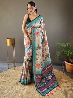 Indulge in the epitome of grace and sophistication with this stunning cream silk saree adorned with exquisite Kalamkari print work and delicately attached tassels on the pallu. Boasting 5.50 meters of sheer elegance, this saree is the perfect embodiment of timeless beauty and contemporary charm, making it an ideal choice for your upcoming festivals, occasions, and other special functions.
The subtle yet captivating allure of the cream color silk saree exudes a sense of understated elegance, whil Luxury Slub Silk Traditional Wear With Kalamkari Print, Luxury Anarkali Saree With Kalamkari Print, Luxury Saree With Printed Border For Transitional Season, Luxury Kalamkari Print Chanderi Choli, Luxury Kalamkari Print Saree For Traditional Ceremonies, Luxury Fitted Choli With Kalamkari Print, Luxury Traditional Salwar Kameez With Kalamkari Print, Luxury Kalamkari Print Traditional Wear For Ceremonies, Luxury Kalamkari Print Traditional Wear For Festivals