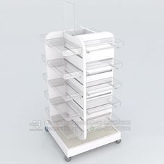 a white cart with many drawers on it