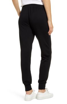 Supersoft and stretchy, these joggers have a slim yet relaxed fit that feels right at home in your casual wardrobe. 27 1/2" inseam Elastic/drawstring waist Front slant pockets 95% modal, 5% spandex Machine wash, tumble dry Made in the USA t.b.d. Loosely Fitted Pull-on Style Sweatpants, Black Sweatpants With Comfort Stretch For Jogging, Black Comfort Stretch Sweatpants For Jogging, Relaxed Fit Athleisure Elastane Pants, Relaxed Fit Joggers With Elastic Side Panels For Loungewear, Loungewear Joggers With Elastic Side Panels, Casual Joggers For Leisure, Comfort Stretch Athleisure Pants For Lounging, Stretch Drawstring Lounging Activewear