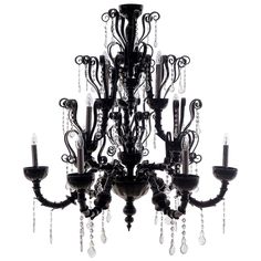 a black chandelier with crystal drops hanging from it's center and sides