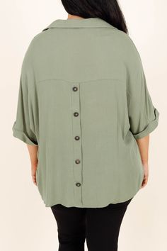 We are so in love with this top! It is the perfect way to feel comfortable and look stylish! Its flowy fit allows for ease of movement, while its gorgeous sage color adds a subtle touch of elegance! Ideal for a day out or day in the office, the Carefree Top is the ideal wardrobe staple! 100% Rayon Casual Light Green Fall Top, Casual Light Green Top For Fall, Chic Relaxed Fit Khaki Top, Casual Solid Color Flowy Blouse, Flowy Solid Color Casual Blouse, Casual Solid Flowy Blouse, Flowy Casual Blouse, Oversized Green Blouse For Day Out, Oversized Green Chic Top