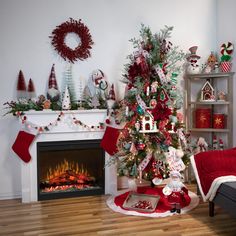 a decorated christmas tree in front of a fireplace