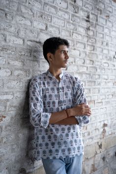 This is a Handblock printed shirt for men made in cotton Casual Printed Patterned Kurta, Casual Patterned Printed Kurta, Relaxed Cotton Tops With Printed Motifs, Cotton Tops With Relaxed Fit And Printed Motifs, Casual Patterned Kurta With Printed Motifs, Casual Printed Cotton Kurta, Traditional Cotton Block Print Tops, Casual Cotton Kurta With Printed Motifs, Casual Cotton Shirt With Printed Motifs