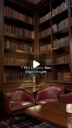 the library bar is full of leather chairs and bookshelves with red leather couches