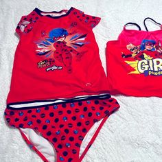 Miraculously Lady Bug 3 Piece Bathing Suit Condition- Gently Used. 3 Piece Bathing Suit Girls Size 14-16 Was Only Used Once, Has Been Washed And Sanitized. This Is From A Non Smoke Home. Playful Fitted Sets With Character Print, Cute Red Swimwear For Playtime, Playful Multicolor Swimming Sets, Fitted Red Playwear Sets, Playful Red Fitted Sets, Playful Red Fitted Set, Playful Black Sets With Character Print, Playful Fitted Red Sets, 3 Piece Bathing Suit