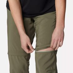 a person with their hands in the pocket of his pants