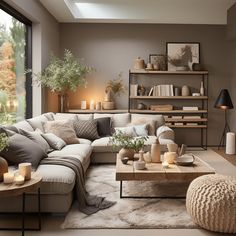 a living room filled with lots of furniture and decor on top of a white rug