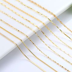 SPECIFICATIONSBrand Name: HOYONItem Weight: 0.01gOrigin: Mainland ChinaCertificate: YESMain Stone: noneMetals Type: NoneGender: WomenNecklace Type: Chains NecklacesOccasion: AnniversaryChain Type: Snake ChainItem Type: NECKLACESCertificate Type: Third Party AppraisalStyle: TRENDYSide Stone: NoneCertificate Number: GDTCModel Number: K gold plated chainis_customized: YesShape\pattern: StarFine or Fashion: FineType: chain necklacePack: Independent packaging with jewelry boxSuitable for gift-giving Gold Neck Chain, Engagement Stage, Engagement Stage Decoration, Golden Snake, Gold Earrings Models, Gold Jewellry, Stage Decoration, Gold Chain Design, Bone Necklace