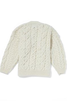 Indulge your little ones with the comfort and warmth of the Grá Traditional Children's Lumber Cardigan in Cream. Made with great attention to detail, this Grá Traditional Aran Cardigan is a timeless piece that exudes comfort and style. Crafted with a selection of traditional Aran stitches including the iconic honeycomb and cable stitches, this cardigan boasts of intricate design and quality workmanship. The beautiful shanked football buttons add a touch of sophistication to the overall look of t Winter Cotton Cable Knit Cardigan, Winter Cable Knit Cotton Cardigan, Cotton Cable Knit Crew Neck Cardigan, Classic Winter Chunky Knit Cardigan, Oversized Cotton Cable Knit Cardigan, Oversized Cable Knit Cotton Cardigan, Cotton Cable Knit Cardigan For Cold Weather, Cable Knit Cotton Cardigan For Cold Weather, Cotton Winter Cardigan For Cold Weather