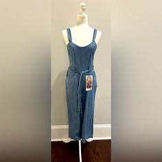 Jean Jumpsuit. Nwt. Never Worn. 100% Cotton. Zipper On Side. Summer Washed Blue Fitted Jumpsuits And Rompers, Fitted Washed Blue Jumpsuits And Rompers For Summer, Blue Cotton Overalls For Loungewear, Fitted Cotton Overalls In Washed Blue, Fitted Washed Blue Overalls, Jumpsuit Jean, Jean Jumpsuit, Jeans Jumpsuit, Pant Jumpsuit