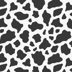 a black and white cow print pattern that looks like it has spots on the skin