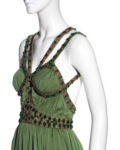 Fitted Embellished Green Mini Dress, Green Beaded Party Dresses, Fitted Green Embellished Mini Dress, Embellished Green Mini Dress For Summer, Glamorous Green Silk Dress, Green Mini Dress For Evening, Green Embellished Fitted Dress, Glamorous Green Mini Evening Dress, Green Embellished Cocktail Dress