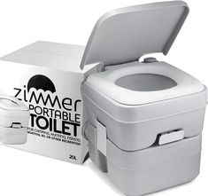 a white toilet sitting next to a box on top of it's back legs