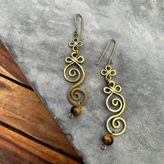 Brand New Handmade Earrings From Colombia. This Style Is Great For All Day Wearing Because It Is So Light! *The Spiral Represents The Journey That All Human Life Involves In The Evolution Of One's Consciousness. It Can Be Understood As The Path That Leads Through The Labyrinth To The Unity Or Self (Who One Truly Is) Located At Its Center.* Adjustable Spiral Brass Earrings, Adjustable Swirl Wire Wrapped Earrings, Adjustable Wire Wrapped Swirl Earrings, Hammered Wire Jewelry, Handmade Bead Jewellery, Wire Jewelry Earrings, Aluminum Jewelry, Wire Jewelry Tutorial, Wire Jewelry Designs