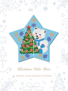 a cross stitch christmas bear with a tree on it's star shaped ornament