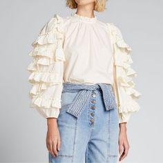 Poplin Blouse With Tiered Ruffle Trim Ruffled Collar Long Blouson Sleeves Boxy Fit. Button/Keyhole Back 100% Cotton New Without Tags Size 6 Orig $295 Feminine Off White Blouse With Ruffles, Off White Feminine Blouse With Ruffles, Feminine Off-white Blouse With Ruffles, Feminine Cream Ruffled Blouse, Feminine Cream Blouse With Ruffles, Feminine Cream Blouse With Ruffle Sleeves, Cream Feminine Blouse With Ruffle Sleeves, Cream Blouse With Ruffled Collar, Cream Blouse With Ruffled Collar And Details