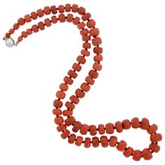 This vintage coral bead necklace is simply stunning! The simple design features a row of graduating coral beads, which are hand strung on red thread, and knotted in between. The coral is natural and untreated, displaying a beautiful range of deep orange and red colors. Each bead is lightly faceted, giving the surface a soft, light-catching sparkle. The necklace fastens securely in the back with a modern 14kt white gold clasp (stamped "585" inside), which is magnetized for ease and convenience. When worn, the strand of beads drapes beautifully below the neckline, where it makes a prominent and colorful statement. Perfect for the coral lover, this gorgeous necklace would look equally beautiful worn alone or layered with other beads! The necklace measures 19.5" in total length (including the Coral Beads Necklace, Red Thread, Deep Orange, Natural Coral, Coral Necklace, Coral Beads, Gorgeous Necklaces, Bead Necklace, Simple Design