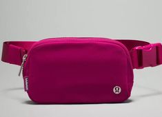 This Lululemon Everywhere belt bag in Wild Berry color is a stylish and functional accessory for anyone on-the-go. With dimensions of 7.5 x 5 x 2 inches, it is the perfect size for carrying your essentials. The bag features a solid pattern and a coated finish for added durability. The lining is made of high-quality fabric, and the handle/strap comes in a matching Wild Berry color. The Lululemon Om Bag product line is known for its quality and craftsmanship, and this belt bag is no exception. It Everyday Lululemon Mobile Phone Bag, Lululemon Casual Rectangular Bag, Casual Rectangular Lululemon Bag, Casual Lululemon Bag With Cell Phone Pocket, Lululemon Everywhere Belt Bag, Everywhere Belt Bag, Berry Color, Wild Berry, Functional Accessories