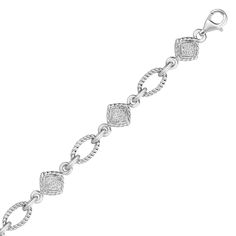 Diamond studded square sections alternate with cable inspired oval links on this gorgeous sterling silver bracelet. A positively stunning arm ornament measuring 7 1/4'' and secured with a lobster clasp. Bracelet With Diamonds, Diamond Chain, Buying Diamonds, Sterling Silver Bracelet, Diamond Bracelets, Silver Diamonds, Diamond Studs, Silver Bracelets, Link Bracelets