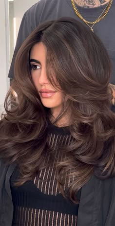 52. Rich Brunette + Mega Volume In the 1970s and 1980s, the term “butterfly haircut” was used to describe a hairstyle popularized by Farrah... Butterfly Hairstyle, Haircut Selfie, Photo Hijab, Haircuts For Long Hair With Layers, Cute Hairstyle, Long Hair Updo