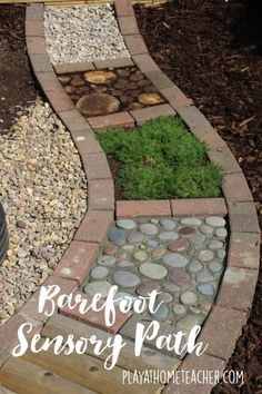 a garden path made out of bricks and stones with the words rock foot sensory path