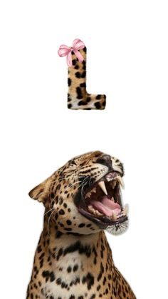 a leopard with its mouth open and the letter j above it has a pink bow