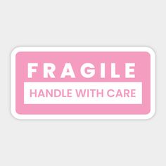 fragile handle with care sticker in pink on white background, text reads fragile handle with care