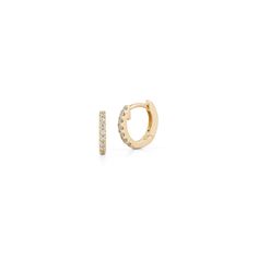 These pavé-set diamond and gold mini huggie earrings are a perfect size for those looking to fill 2nd, 3rd, 4th etc. piercings, or for those with petite earlobes. These diamond huggies hug your earlobe just right and are a brilliant addition to your ear stack. For most people, the mini huggies will fit in your second or third piercing, but some can wear these in their first hole. These diamond huggie earrings are the everyday staple earrings you've been hunting for. They are a favorite of the Da Yellow Gold Huggie Cartilage Earrings With Diamond Accents, Fine Jewelry Diamond Huggie Piercings, Fine Jewelry Huggie Earrings With Pave Setting, Yellow Gold Diamond Huggie Earrings With Pave Setting, 14k Gold Huggie Earrings With Pave Setting, Minimalist Diamond Huggie Earrings With Pave Setting, Minimalist Yellow Gold Huggie Earrings With Pave Setting, Cubic Zirconia Huggie Piercings, Third Piercing