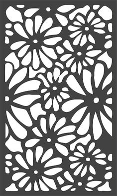 the cut out paper with flowers on it is shown in dark brown and white colors