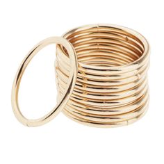 stack of gold rings on white background