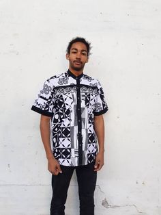 Dress up and go for a party. Or wear casual with jeans. Chinese collar. Short sleeves. Black and white african print fabric. Original ghanian fabric.  Patchwork zero waste shirt made of leftover pieces. Patterns may vary but all are beautifully unique and handmade. 100% cotton. Made in Ghana. Short Sleeve Patchwork Shirt For Streetwear, Patchwork Short Sleeve Shirt For Streetwear, Fitted White Patchwork Shirt, White Collared Shirt With Geometric Pattern, Fitted Patchwork Short Sleeve Shirt, African Print Shirts For Men, Ankara Shirts For Men, African Print Shirt, Chinese Collar