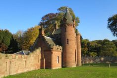 an old brick castle with turrets and towers