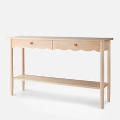 a wooden console table with two drawers