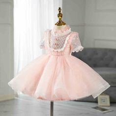 Winter Holiday Princess Dress With Ruffles, Princess Style Ruffled Tutu Dress For Winter, Spring Princess Dress With Puff Sleeves For Dress-up, Pink Short Sleeve Winter Dresses, Cute Princess Dress With Puff Sleeves And Ruffles, Pink Puff Sleeve Princess Dress For Dress-up, Cute Tulle Princess Dress With Short Sleeves, Sweet Short Sleeve Princess Dress For Dress-up, Cute Princess Dress With Ruffles And Short Sleeves