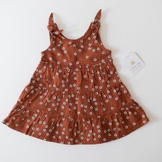 New Little Co By Lauren Conrad Dress - Never Worn, Tags Still Attached - Cute Floral Pattern - Adjustable Ties On The Top Straps - Button Closure On The Back - Size 6 Months - Excellent Condition Follow For New Listings Daily! Bundle Multiple Items And Save On Shipping! Cute Brown Spring Dress, Spring Dress-up Brown Dress, Brown Spring Dress For Dress-up Occasions, Brown Dress For Spring Dress-up Occasion, Cute Brown Summer Dress, Cute Brown Cotton Dress, Brown Cotton Floral Print Dress, Top Straps, Lauren Conrad Dress