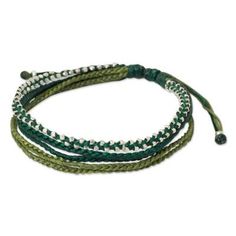 Thailand's Napapat selects fresh shades of green for the design of this cord bracelet. Braided by hand the five strand wristband is dotted with luminous silver accents. .950 Silver Green Multi-strand Adjustable Beaded Bracelets, Green Beaded Wrap Bracelet, Adjustable Green Multi-strand Beaded Bracelets, Adjustable Green Beaded Wrap Bracelet, Adjustable Multi-strand Green Beaded Bracelets, Green Adjustable Multi-strand Beaded Bracelets, Adjustable Green Beaded Braided Bracelet, Adjustable Green Braided Beaded Bracelets, Green Beaded Bracelets With Adjustable Cord For Friendship