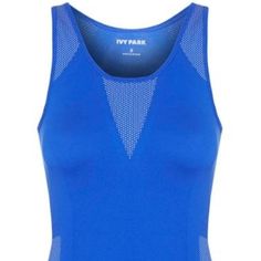 Ivy Park Blue Racer Back Seamless Tank Xxs/Xs Nwt. It's Spring And We Are Ready To Work Out Doors Or In The Gym. This Light Weight Seamless Tank Checks Off All Boxes!. High Stretch, Breathable, Sweat Wicking, Quick Drying With Ventation Upper Panel. 73% Polyester/23% Nylon/4% Elastine. Measurements: Bust - 30", Waist - 24", Tank Length From Armpit To Hem - 16". Get Addition To Your Ivy Park Closet. Fitted Blue Top With Seamless Design, Blue Seamless Tank Top With Medium Support, Blue Tank Top With Seamless Construction And Medium Support, Blue Medium Support Tank Top, Blue Seamless Yoga Tops, Blue Fitted Breathable Tank Top, Fitted Breathable Blue Tank Top, Fitted Blue Breathable Tank Top, Fitted Blue Tops With Mesh Back