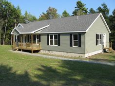 a house with a deck in front of it