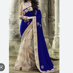 Saree Has Only Been Worn Once To A Wedding. Off White Antique Fine Lace And Embroidered Gold Thread Design On Velvet Crush Cobalt Blue Pallu. Gold Beaded Design Along The Border With Pearl Gotti Work. Does Not Come With Petticoat. Will Come With A Bronze Gold Blouse Size 36. Final Sale. No Trades. Reasonable Offers Only. Hot Pink And Purple Crushed Colors Also Available Please Inquire, But I Only Have One Blouse. Manish Malhotra Dupe. Please Note First Pic Is Of Original Item. This Saree Is Customized. This Is A Traditional Saree And Must Be Pleated Into A Petticoat. Elegant Semi-stitched Royal Blue Saree, Elegant Royal Blue Semi-stitched Saree, Elegant Royal Blue Saree For Wedding, Bollywood Style Royal Blue Dupatta, Semi-stitched Royal Blue Saree, Elegant Royal Blue Saree With Dupatta, Royal Blue Georgette Saree For Wedding, Engagement Kerala, Blouse Fitting