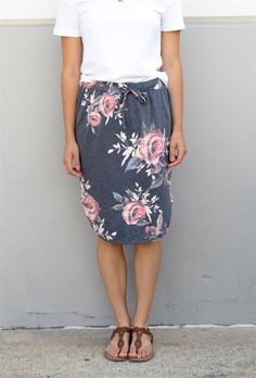 Hey there fashionista! Get ready to add a new favorite to your wardrobe with our Floral Weekend Skirt! We believe you can never have too many florals, and this skirt is no exception. Made with super soft and comfy lightweight fabric, it's perfect for any weekend adventure. The elastic waist ensures a comfortable fit, while the knee-length design adds a touch of sophistication. Dress it down with a white tee and Converse for a casual look, or dress it up with a cardigan and wedges for a night out Casual Floral Print Skirt For Day Out, Casual Floral Print Midi Skirt, Casual Midi Skirt With Floral Print, Casual Floral Print Pencil Skirt, Floral Print Pencil Skirt For Day Out, Casual Pencil Skirt With Floral Print, Conservative Outfits, Comfy Skirt, Modesty Fashion