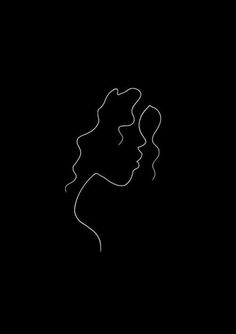 the silhouette of a woman's face on a black background